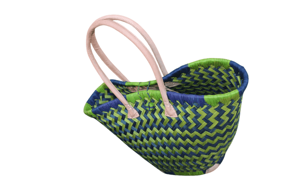 panier tressé qui ferme porté épaule